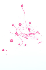 Pink nail polish on white background