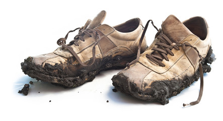 Isolated muddy footwear shoes