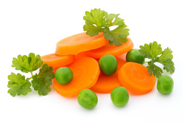 Carrot slice, green peas, isolated on white.