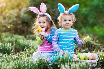 Kids with bunny ears on Easter egg hunt