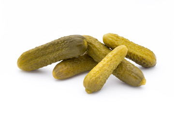 Marinated pickled cucumbers isolated on the white.