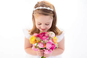 Little girl with flower bouquet