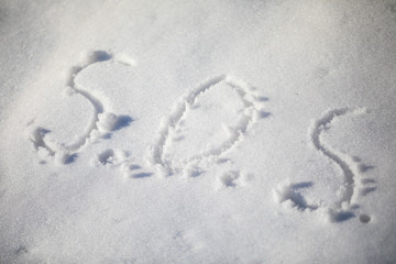 SOS written in the snow