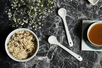 Fototapeta premium Granola served with coffee,milk,fruits