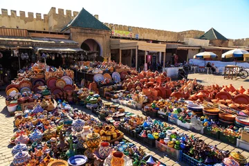 Tuinposter Colorful ceramic souvenirs in a shop in Morocco Meknes © pwollinga