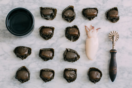 Black ink tortellini