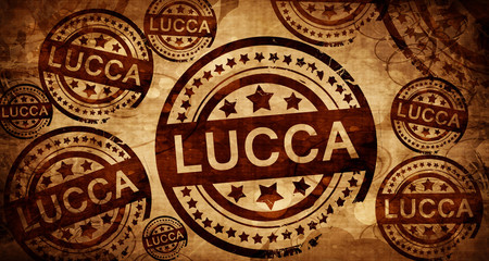 Lucca, vintage stamp on paper background - obrazy, fototapety, plakaty