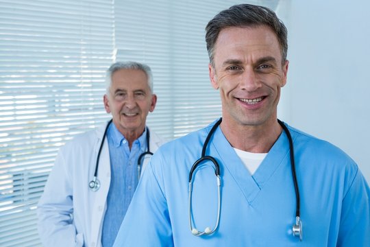 Portrait of smiling doctor and surgeon