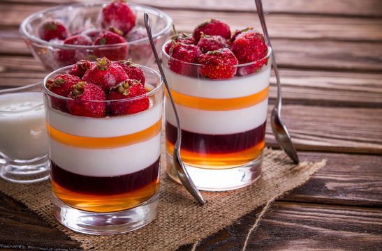 Layered jelly dessert with strawberries