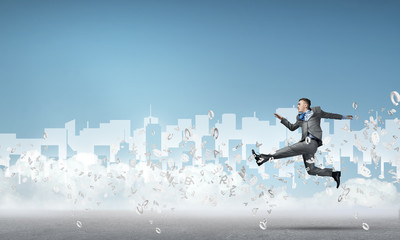 Businessman jumping high