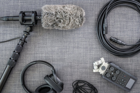 Overhead view of professional digital audio recording equipment and microphone.