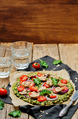 Kale oats pizza crust with tomato, red onion and mushrooms