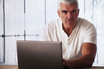 A businessman working on his laptop (Freedom, success, money, wo