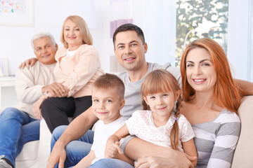 Obraz premium Big happy family sitting on couch