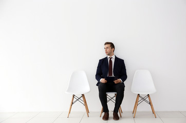 Young man waiting for job interview