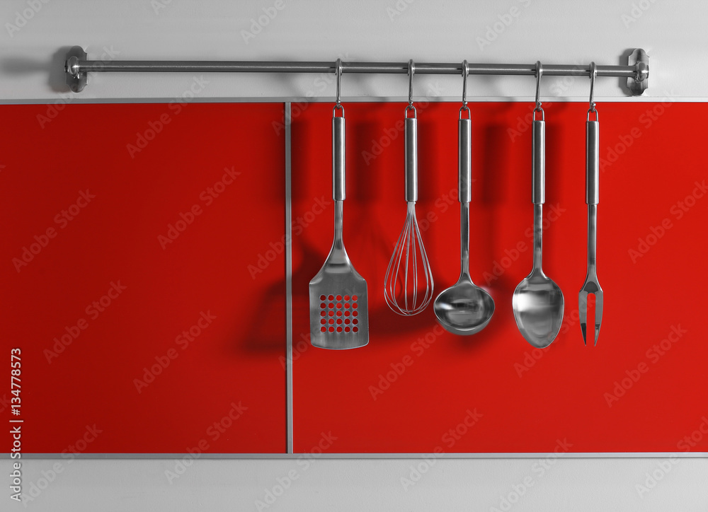 Canvas Prints set of metal kitchen utensils hanging on wall