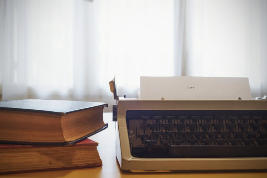 Vintage typewriter on  wooden table