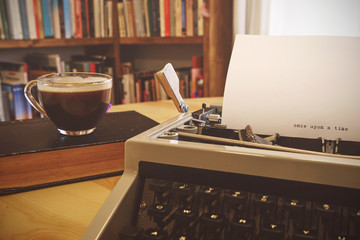 Vintage typewriter on  wooden table
