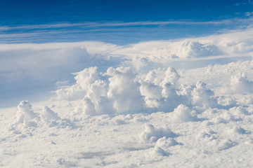 Naklejka na ściany i meble Clouds seen from an airplane