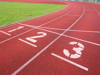 Number one and number two, red rubber running racetrack