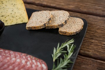 Salami, cheese, rosemary herbs