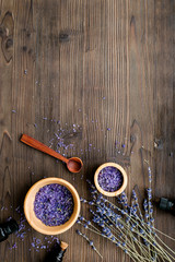 organic cosmetics with lavender on wooden background top view