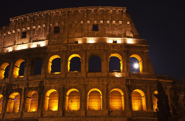 Naklejka premium Colosseum Moon in the Window Close Up Details Rome Italy