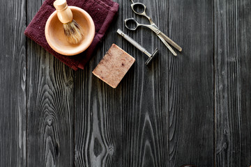 Tools for cutting beard barbershop top view on wooden background