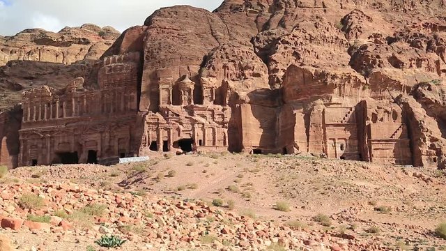 Petra - ancient historical and archaeological rock-cut city in Hashemite Kingdom of Jordan. Overall view of Royal Tombs, from left to the right - Palace Tomb, Corinthian Tomb, Silk Tomb and Urn Tomb