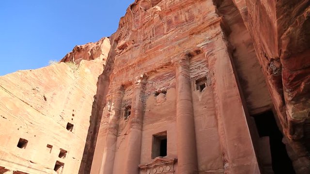 Petra - ancient historical and archaeological rock-cut city in Hashemite Kingdom of Jordan. Facade of Urn Tomb of the Royal Tombs, ancient city of Petra in Jordan
