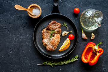 concept cooked steak on dark background top view