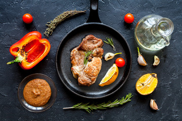 concept cooked steak on dark background top view