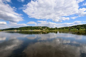 Foto op Canvas Landscape of beautiful Vistula river at summer day. Reflections of clouds in water. Poland. Kazimierz Dolny, Poland © vivoo