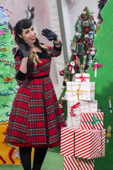 Obraz premium Christmas pinup girl with presents