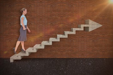 Obraz na płótnie Canvas Composite image of businesswoman walking 3d