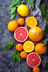 Dissected fresh fruits. Orange, grapefruit and tangerines