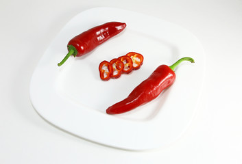 Red chili peppers isolated on the white