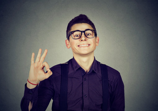 Successful teenager with ok sign