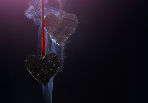 valentines day hearts on red rope in smoke