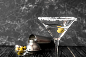 martini cocktail at wooden background close up