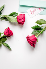 concept Valentine's Day with flower white background top view