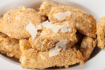 Parmesan Crusted Chicken Tenders in a white serving bowl