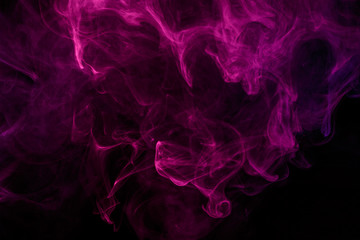 Abstract smoke Weipa. Personal vaporizers fragrant steam. The concept of alternative non-nicotine smoking. Magenta smoke on a black background. E-cigarette. Evaporator. Taking Close-up. Vaping.