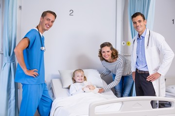 Obraz premium Portrait of doctors, patient and woman in hospital room