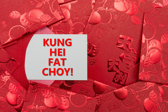 red pockets with a card written KUNG HEI FAT CHOY