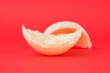 Fresh edible bird's nest on red paper