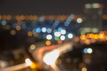 Concept photo for business design and planning. These blurred street lights and heavy traffic are...