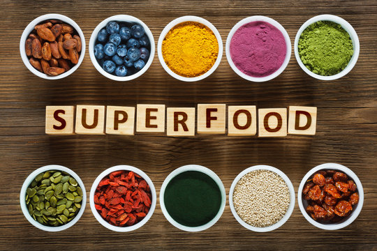 Superfoods on wooden table