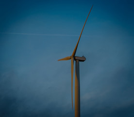 Wind turbine power generators silhouettes,sunset