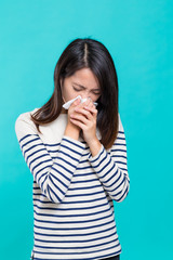 Woman suffer from nose allergy